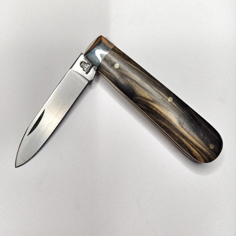 A traditional Sheffield made pocket knife with a spear point blade and ebony handles.