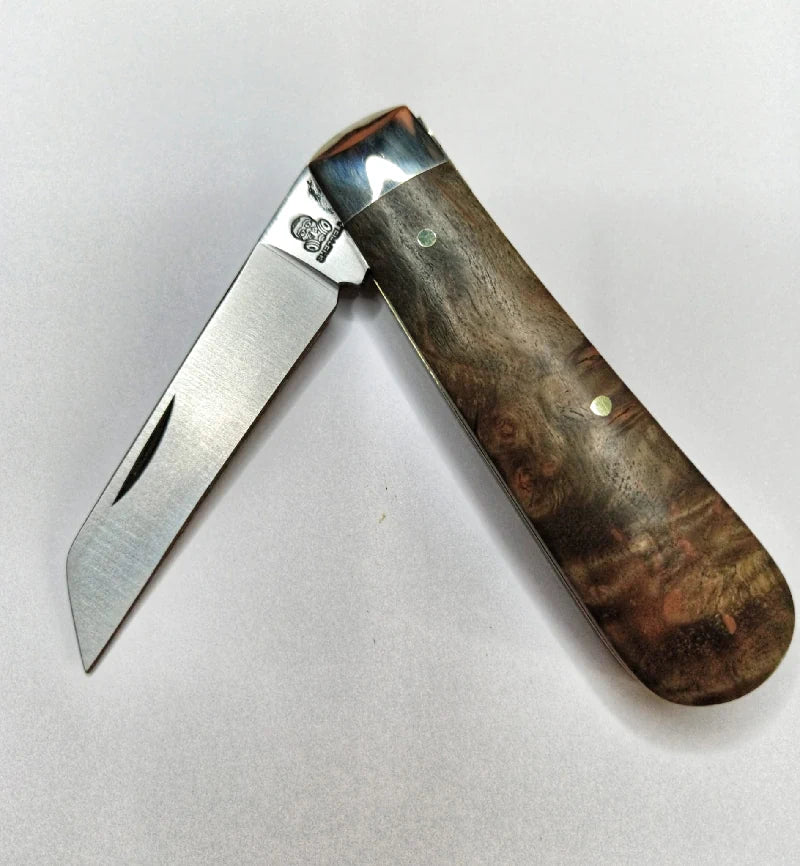 A traditional Sheffield made lambsfoot blade pocket knife with maple burl scales.